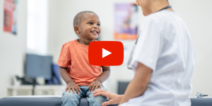 Doctor examining pediatric patient
