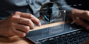 Person reviewing digital files.