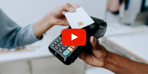 person using a credit card for payment