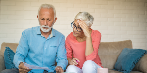 Seniors reviewing medical bills