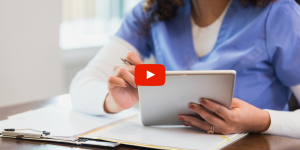 Medical professional reviewing documents