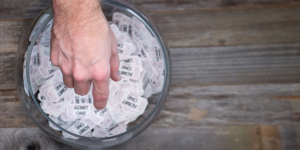 Person drawing raffle tickets