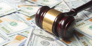 Gavel sitting on money