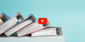 Binders sitting on a shelf