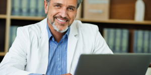 Doctor working on a laptop