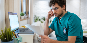 Physician reviewing a document