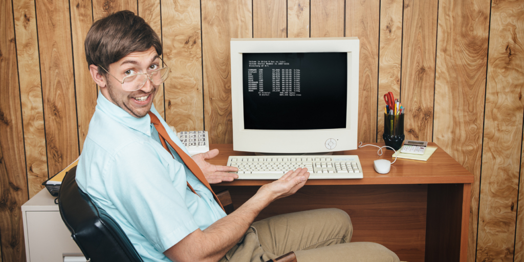 Person showing an old computer system