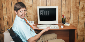 Person showing an old computer system