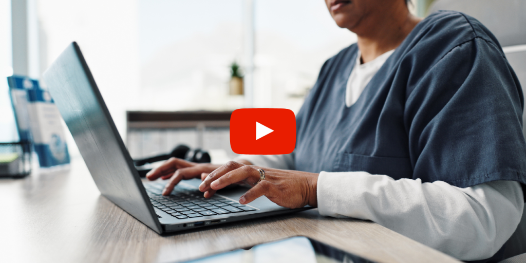 medical professional using a laptop