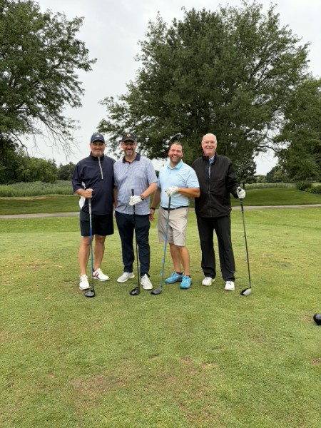 Golfers at the ICS Centennial golf outing at Willow Crest
