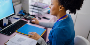 Medical professional entering medical notes