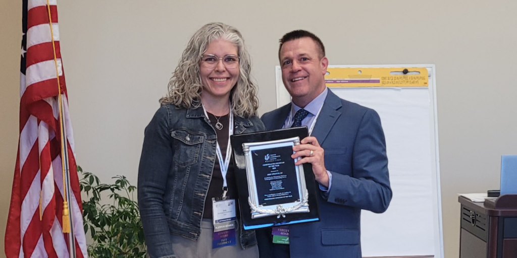 Dr. Erin Strauch and ICS President Dr. Craig Revermann