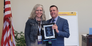 Dr. Erin Strauch and ICS President Dr. Craig Revermann