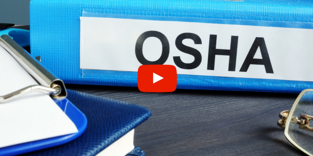 OSHA manual sitting on a desk