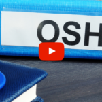 OSHA manual sitting on a desk