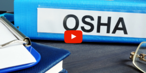 OSHA manual sitting on a desk